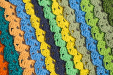 Soyut El yapımı arka plan. El yapımı örme yün şeritler doku