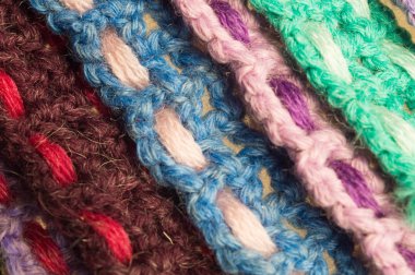 Soyut El yapımı arka plan. El yapımı örme yün şeritler doku