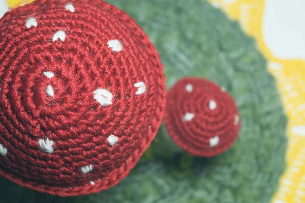 Handmade wool knitted mushroom background — Stock Photo, Image