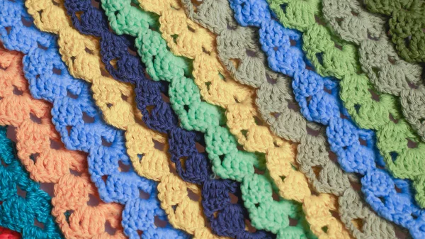 Fundo artesanal abstrato. Tiras de lã de tricô artesanal textura — Fotografia de Stock