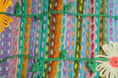 El yapımı çiçek örme yün renkli doku arka plan
