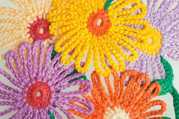 El yapımı yün örme çiçek renkli doku arka plan — Stok fotoğraf