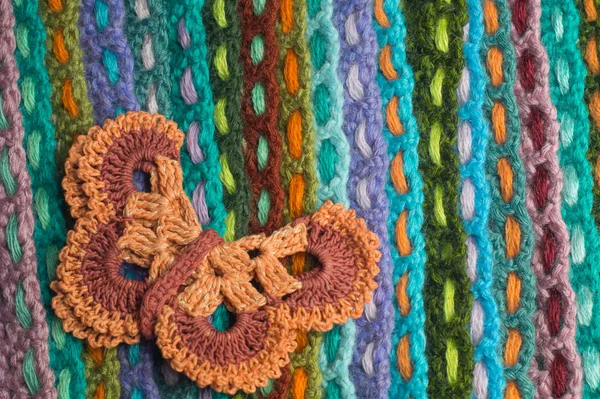 stock image Handmade buterfly wool knitted colorful texture background