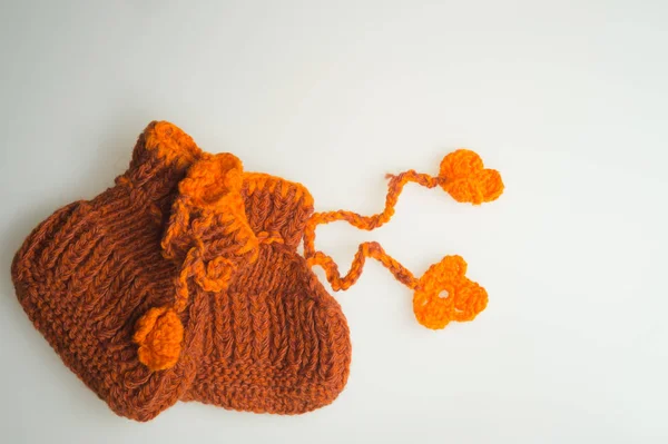 Handmade knitting baby booties isolated on white — Stock Photo, Image