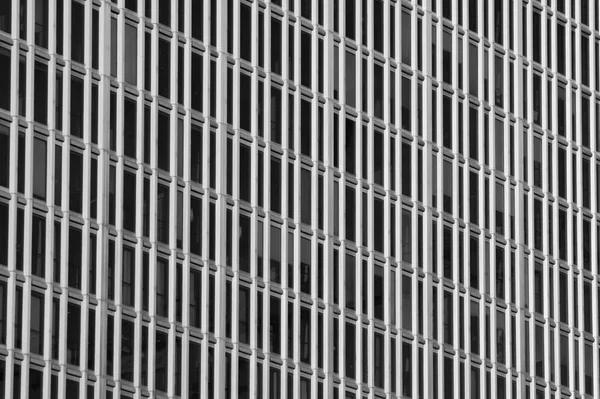 Linhas paralelas de janelas. Fundo abstrato do edifício — Fotografia de Stock