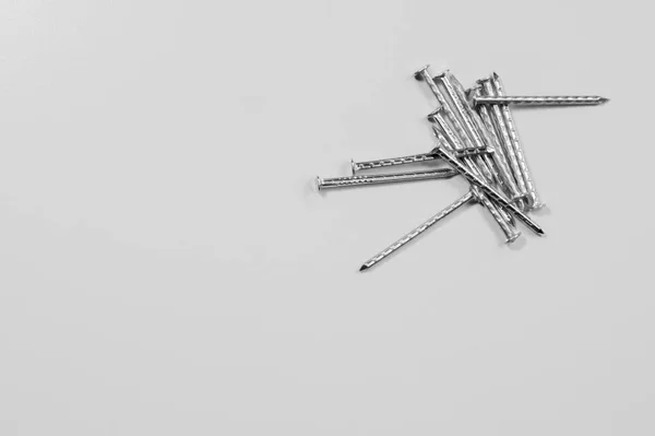 Metal nails isolated on white background. working tools — Stock Photo, Image