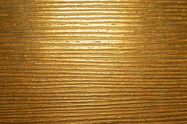 Гофрированный золотой фон с шероховатостью — стоковое фото