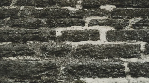 Kőfal háttere. absztrakt szürke grunge textúra. sziklás téglafal falazó — Stock Fotó