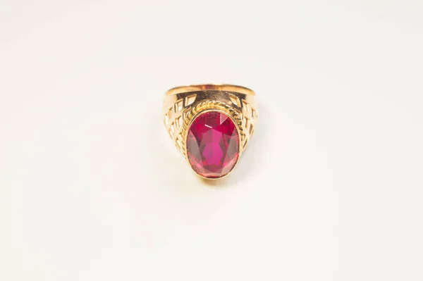 Golden ring with ruby isolated on white — Stock Photo, Image