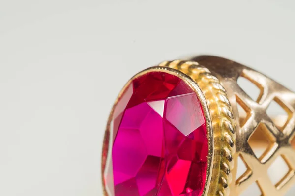 Golden ring with ruby isolated on white — Stock Photo, Image