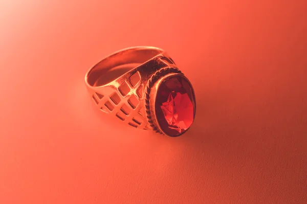 Golden ring with ruby isolated background — Stock Photo, Image