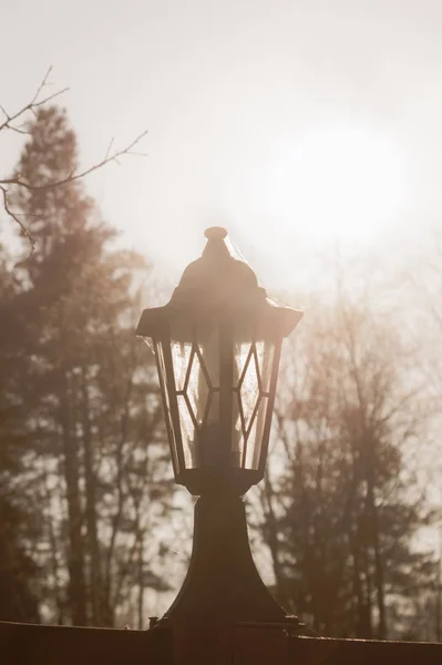 Retro street lamp at sunset. Vintage lantern at evening light — Stock Photo, Image