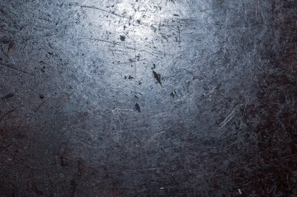 Paslı metal doku arka plan. eski demir plaka doku. çelik duvar. çizikler ile çalışma tezgahı yüzeyi