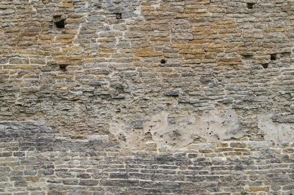 Kayalık tuğla duvar. taş duvar arka plan. soyut grunge doku. eski gri duvar