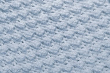 Örülmüş yün dokusu. Kumaş materyali makro. tekstil arkaplanı