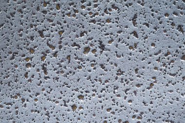 Grunge dokusu. Gri duvar, kapat. kaba bir geçmiş. Benekli taş yüzey