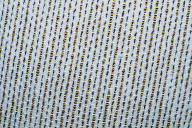 Gri kumaş desenli makro. Tekstil arka planı son derece yakın. örgü deseni