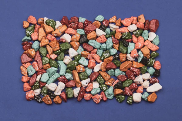 Candy pebbles. sweets in the form of colored stones. colorful candies background