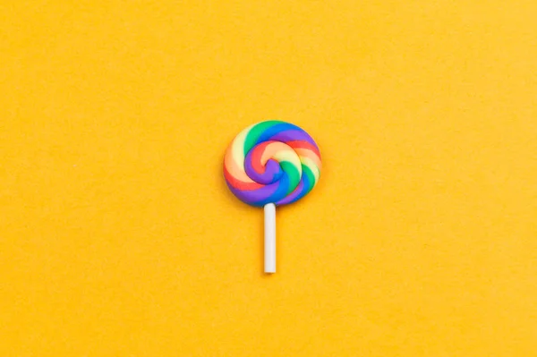 Lollipop Close Colorful Candy Yellow Background Spiral Caramel Copy Space — Stock Photo, Image