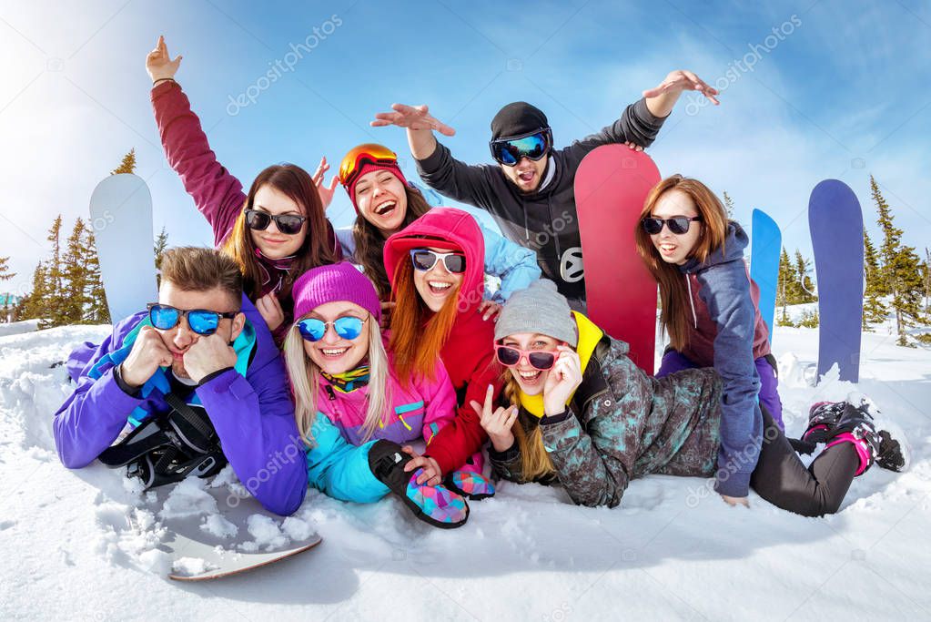 Happy friends having fun at ski resort