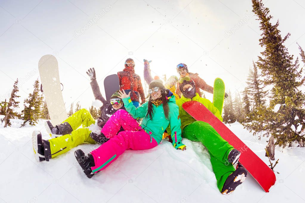 Happy friends ski resort winter sports vacations