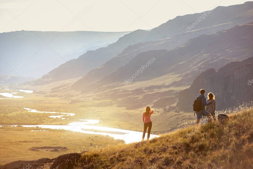 Group tourists travel mountains view