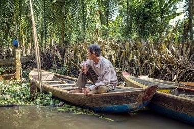 Vietnam, Mekong - 12 Kasım 2017: Mekong nehri yakınlarında Vietnam geleneksel tekneleri