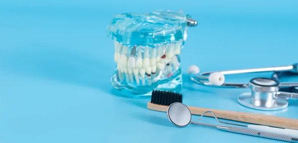 Dentist\'s tool in dental care concept.