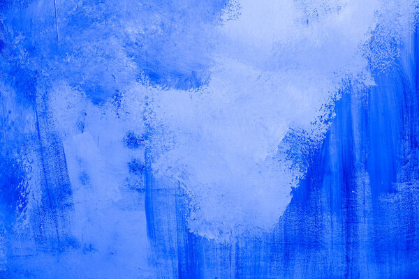 Interesting texture of a concrete wall with a random pattern on its surface