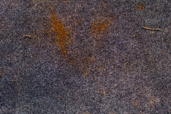 Foto de una vieja alfombra gris con manchas. Grunge textura fondo — Foto de Stock