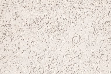 Beton duvar sürtünme ile evin fotoğrafı. Güneşli bir gün. Doku arka plan