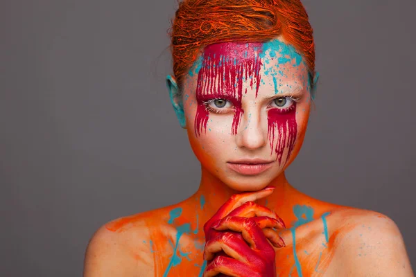 Portrait of a model in an expressive creative style using an unusual make-up — Stock Photo, Image