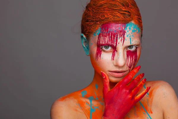Portrait of a model in an expressive creative style using an unusual make-up — Stock Photo, Image