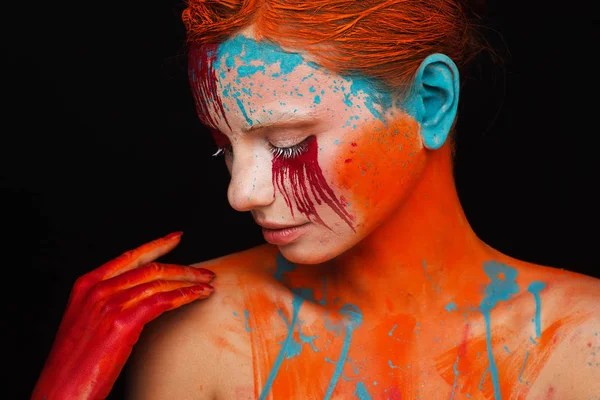 Portrait of a model in an expressive creative style using an unusual make-up — Stock Photo, Image