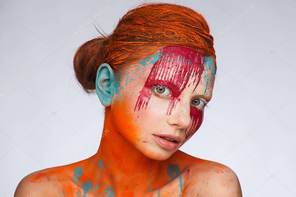 Portrait of a model in an expressive creative style using an unusual make-up