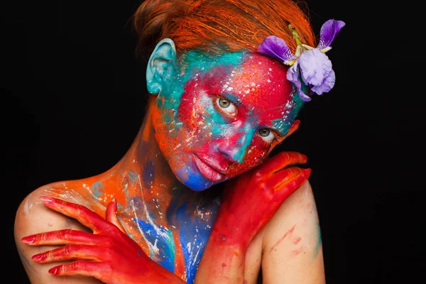 Creative fantastic makeup using colorful paints on the model — Stock Photo, Image