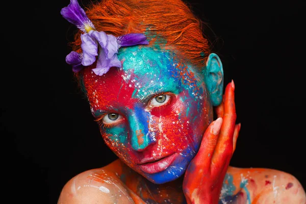 Creative fantastic makeup using colorful paints on the model — Stock Photo, Image