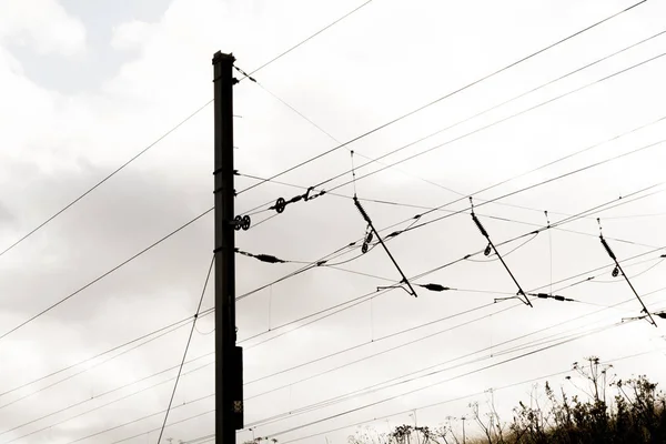Overhead power lines on the railway track