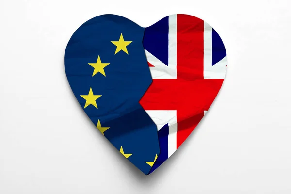 Brexit concept of UK leaving European Union. Union Jack and EU flags form a heart
