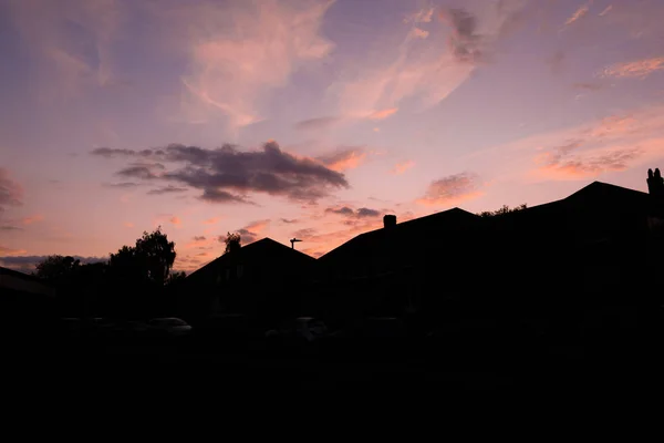 Row of houses in sunset on suburban street — Stock Photo, Image