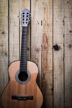 Vintage tarzı ahşap arka plan akustik gitar. Alan zekâsını kopyalama