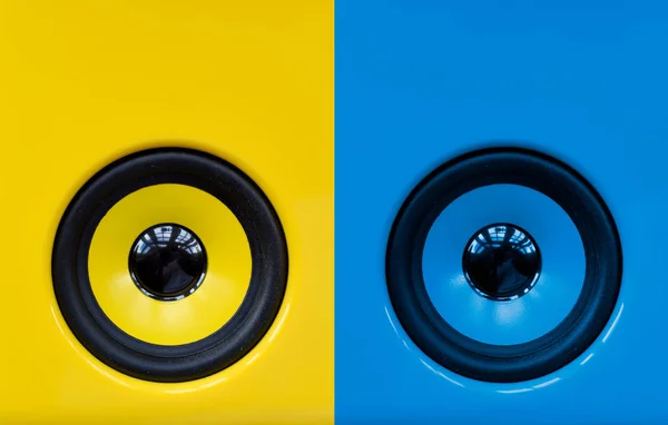 Bright blue and yellow speakers for playing loud dance party mus