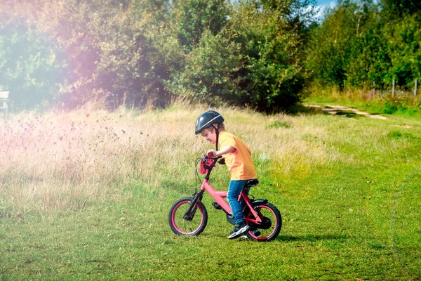 Young School Age Boy Rides His Bike Path Field — Stock Photo, Image
