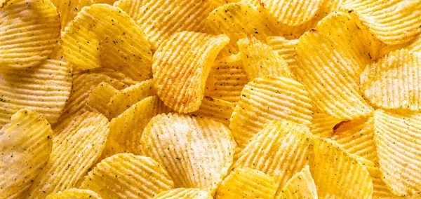 Pattern of potato chips, panorama, top view,flat lay
