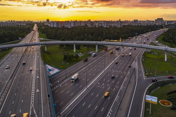 View from the air on the movement of cars on the overpasses at t