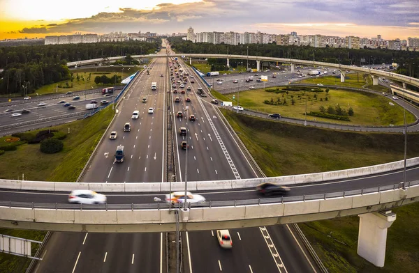 View from the air on the movement of cars on the overpasses at t