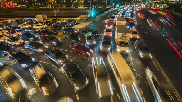 Night traffic jam on the crossroad Stock Picture