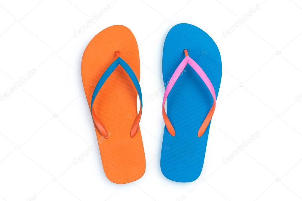 Blue and Orange flip flops isolated on white background. Top view