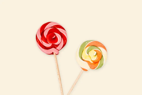 Colorful Spiral Lollipops Yellow Background — Stock Photo, Image