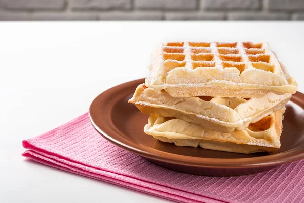 Belgian waffles with icing sugar — Stock Photo, Image